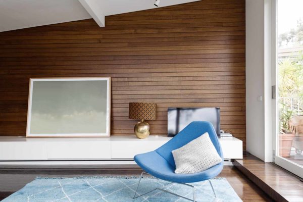 horizontal wood panelling in mid century living room